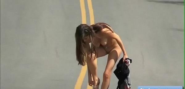  Sexy and naughty amateur brunette Nina walks naked on the street and show her nice big natural boobs
